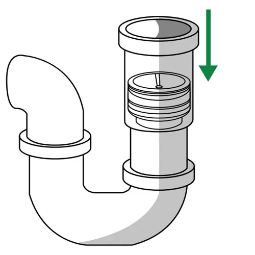 Inserting the Green Drain into the drain body with silicone flaps pointing down